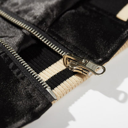 YKK metal zipper and striped rib hem detail on the Japanese souvenir jacket.