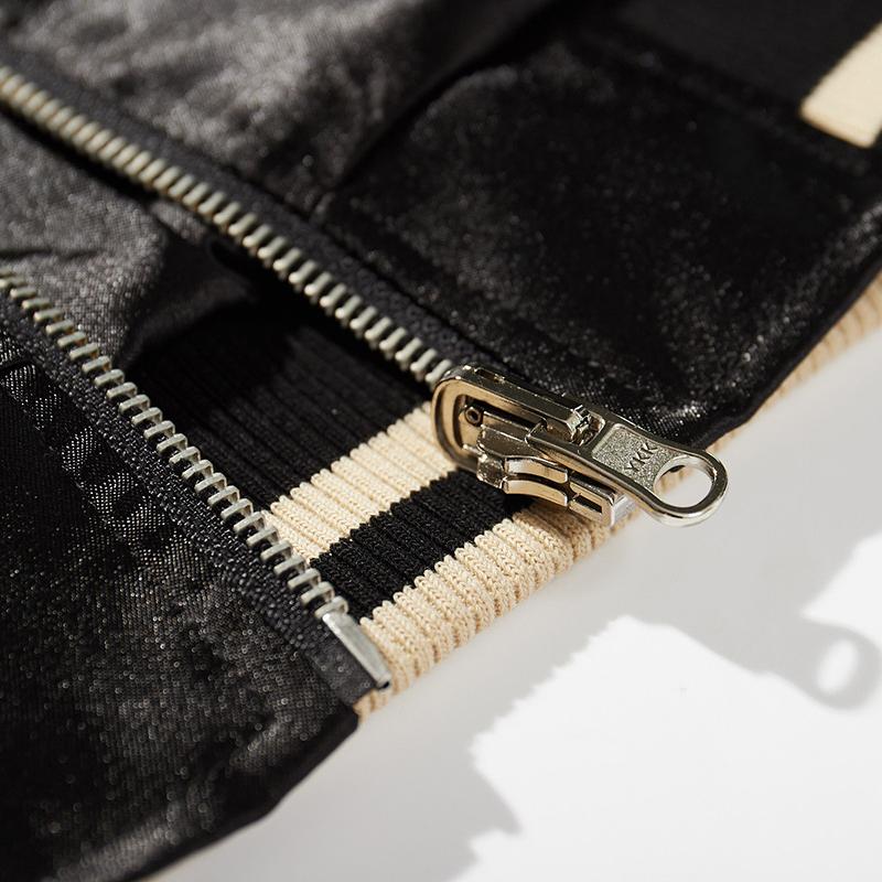 YKK metal zipper and striped rib hem detail on the Japanese souvenir jacket.