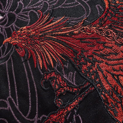 Phoenix wing embroidery with layered threadwork and texture