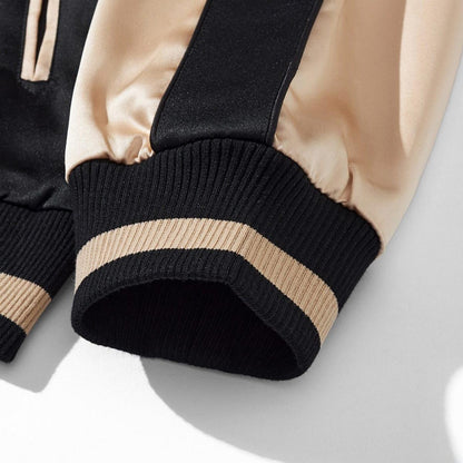 Ribbed cuff detail with contrast stripe