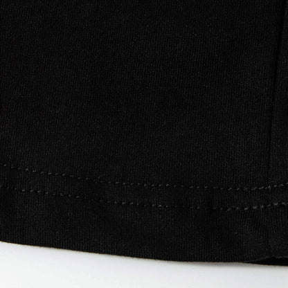 Close-up of double-stitched hem and cotton knit texture