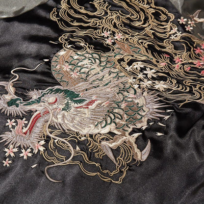 Close-up of dragon and clouds embroidery on a black sukajan