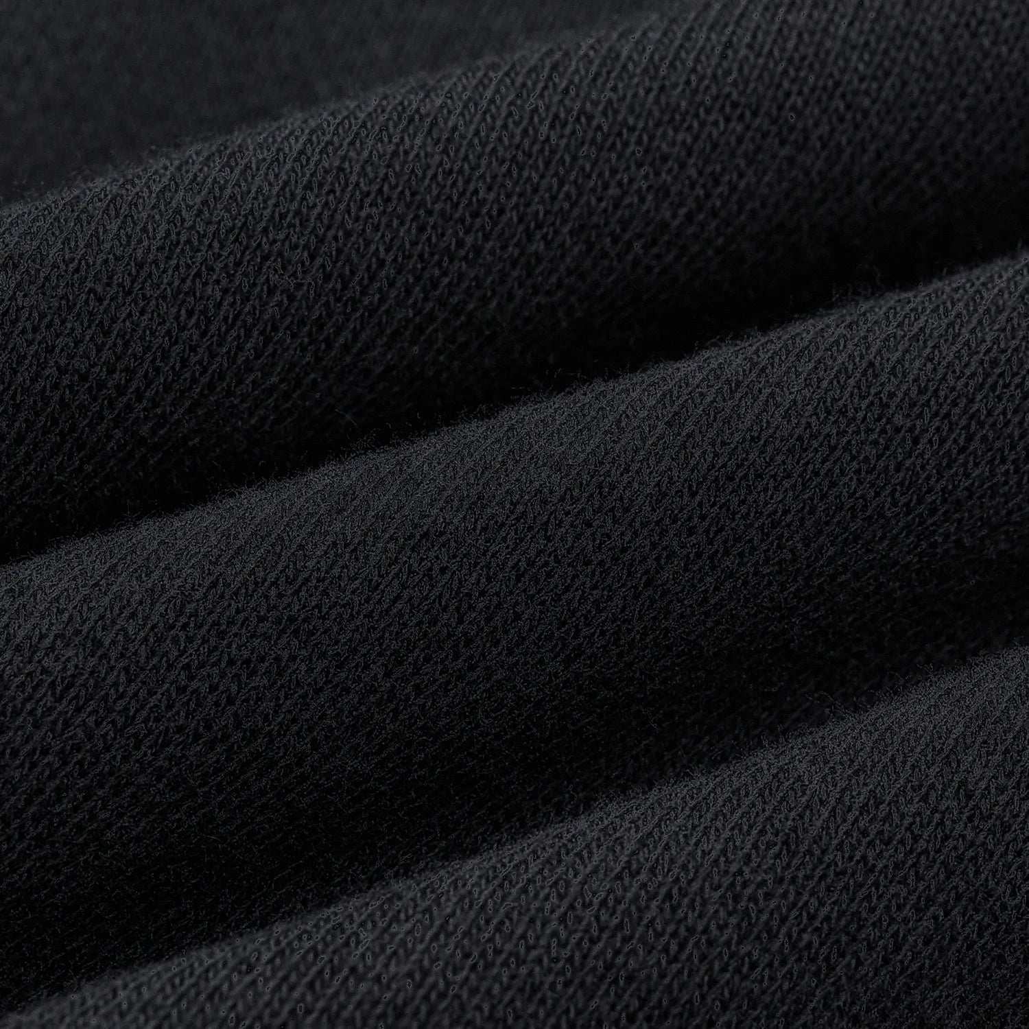Close up of soft inner fleece fabric on black Nine-Tailed Fox & Lotus sweatshirt.