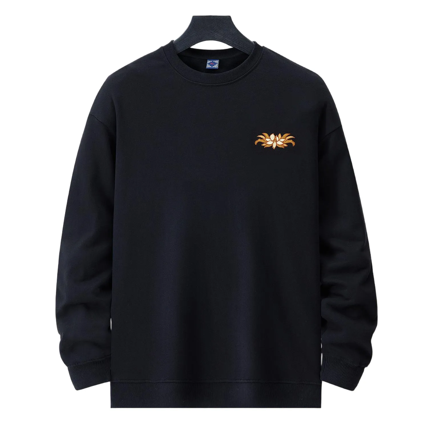Front view of black Nine-Tailed Fox & Lotus sweatshirt with small lotus emblem on chest.
