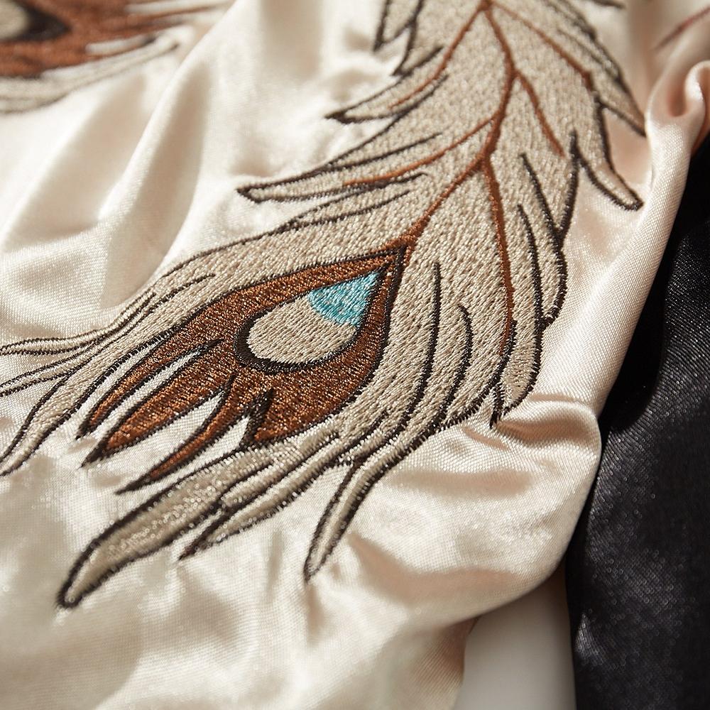 Close-up of phoenix feather embroidery on a sukajan