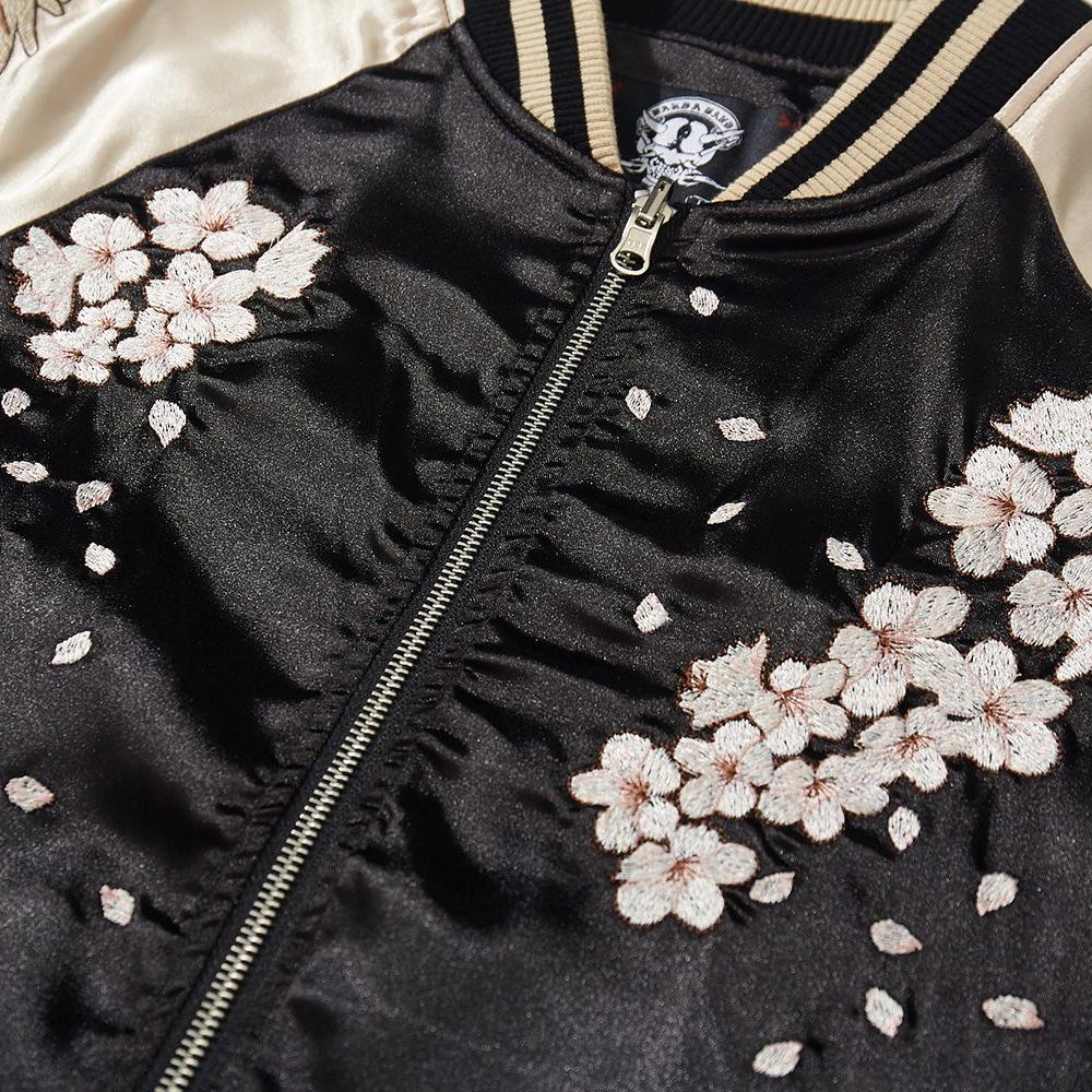 Close-up of sakura blossom embroidery on the front of a sukajan