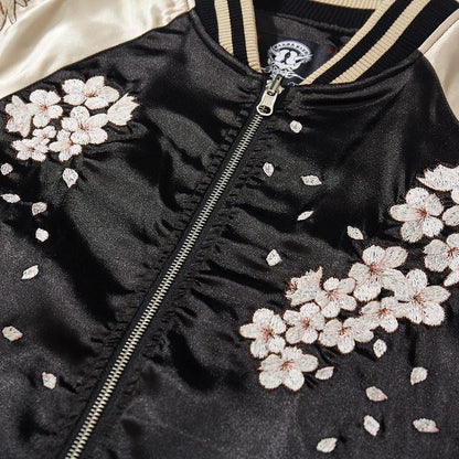 Close-up of sakura blossom embroidery on the front of a sukajan