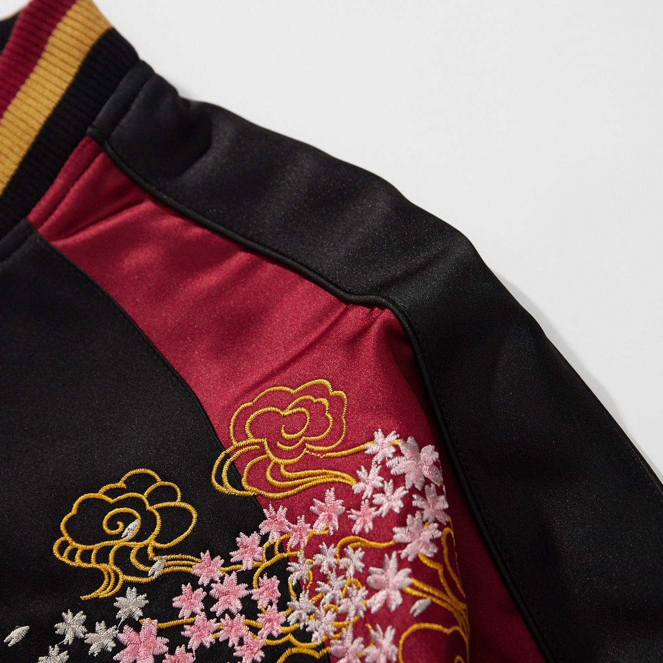 Satin shoulder panel detail with black side stripe