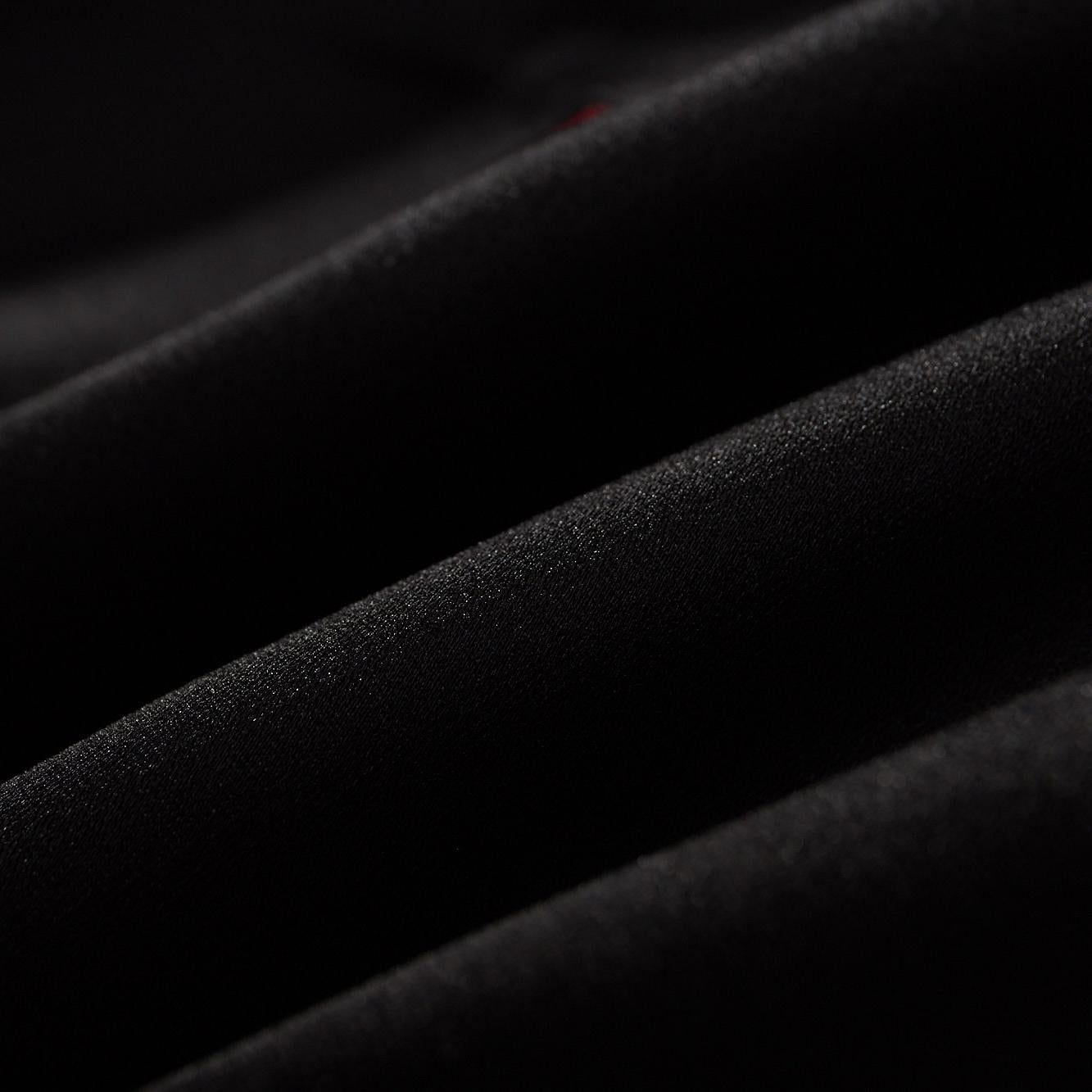 Smooth satin fabric texture—soft sheen and fluid drape