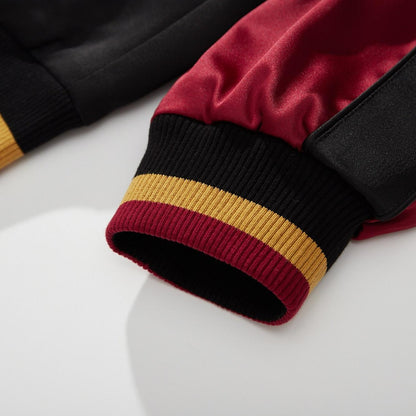 Ribbed cuff with red–gold stripes for a snug, comfortable fit