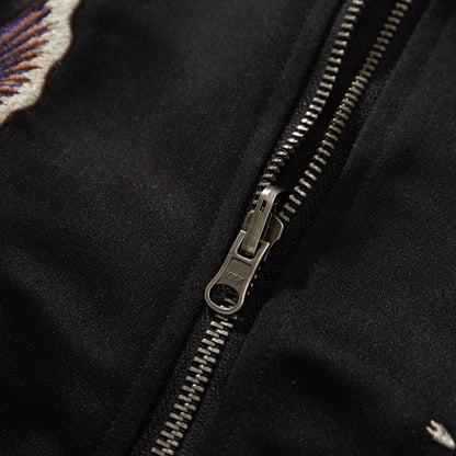 Close-up of the YKK metal zipper pull and teeth for a smooth, durable glide