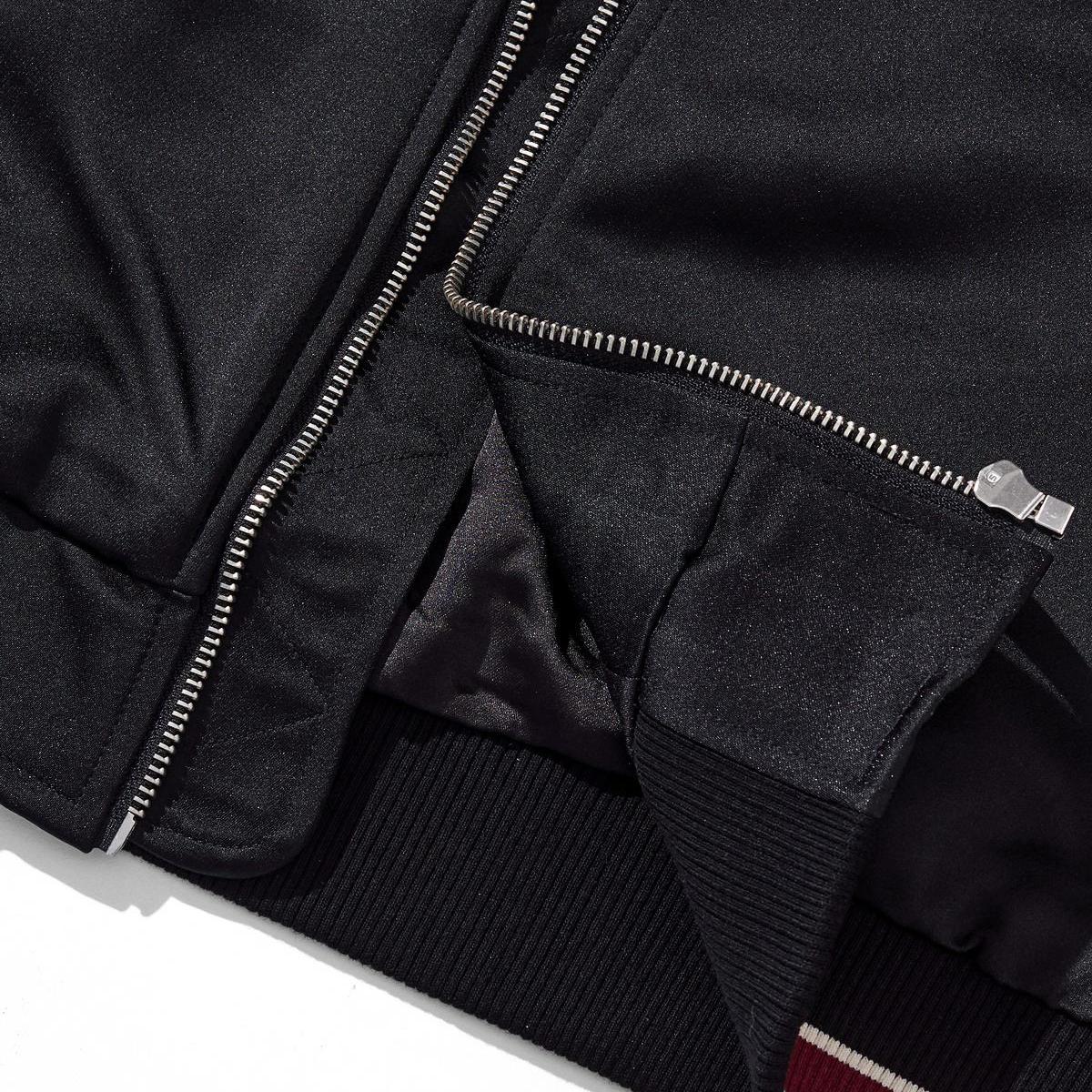 Hem and placket construction shown with the zipper open