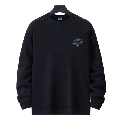 Front view of the black Kirin & Lotus Embroidered Sweatshirt with a small lotus at the left chest