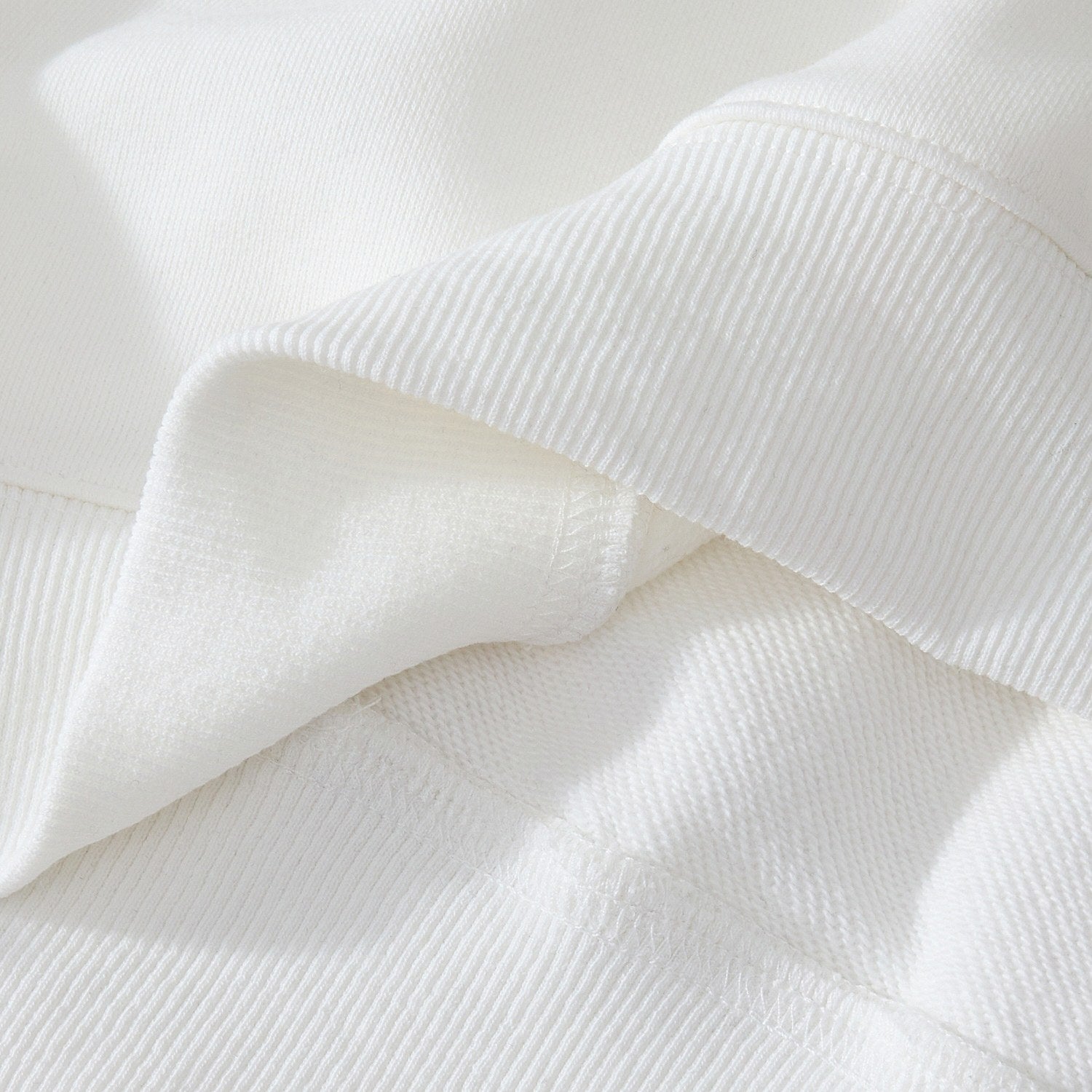 Hem and inner rib detail showing durable overlock stitching
