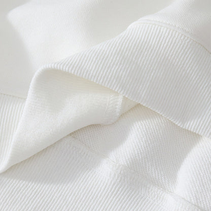 Hem and inner rib detail showing durable overlock stitching