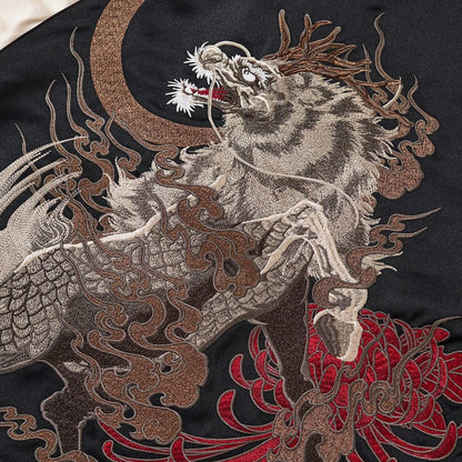 Close-up of the kirin and crescent-moon back embroidery with flowing clouds