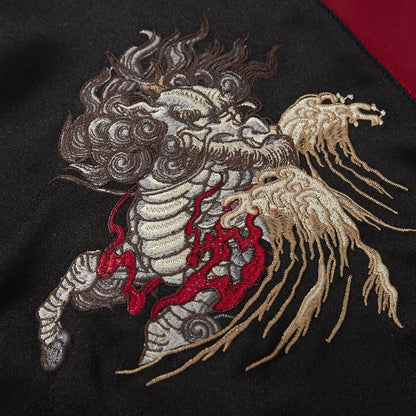 Close-up of kirin head embroidery with layered satin stitches and flowing whiskers
