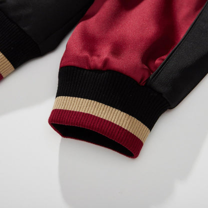 Elastic cuff finished with beige-and-red rib stripes