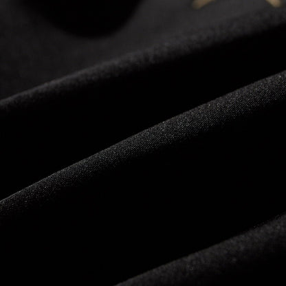 Close-up of satin twill fabric with a smooth, subtle sheen and tight weave