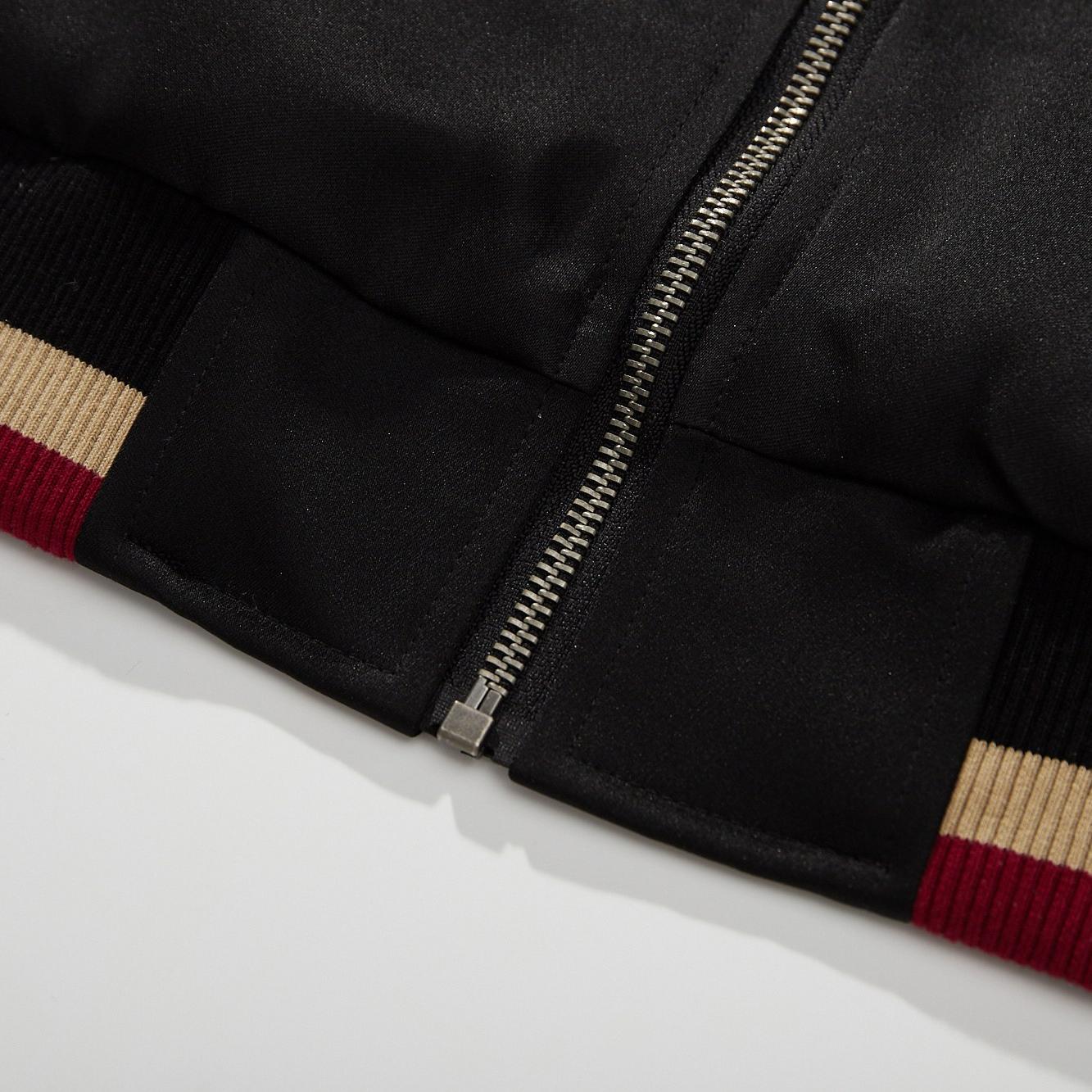 Bottom zipper guard and tidy stitching at the hem