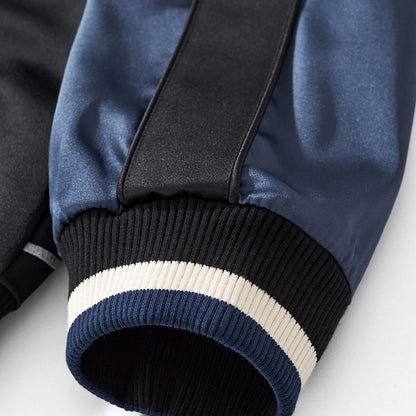 Ribbed cuff close-up illustrating firm elasticity and stripe knit