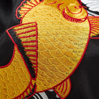 Detailed view of koi embroidery with scale texture and clean outlines