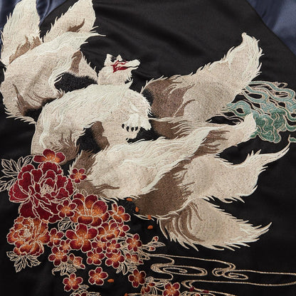 Detailed view of the back nine-tails and floral bouquet embroidery