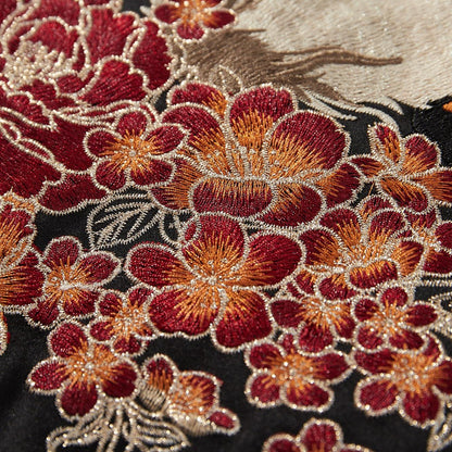 Peony blossom embroidery with rich thread shading close-up