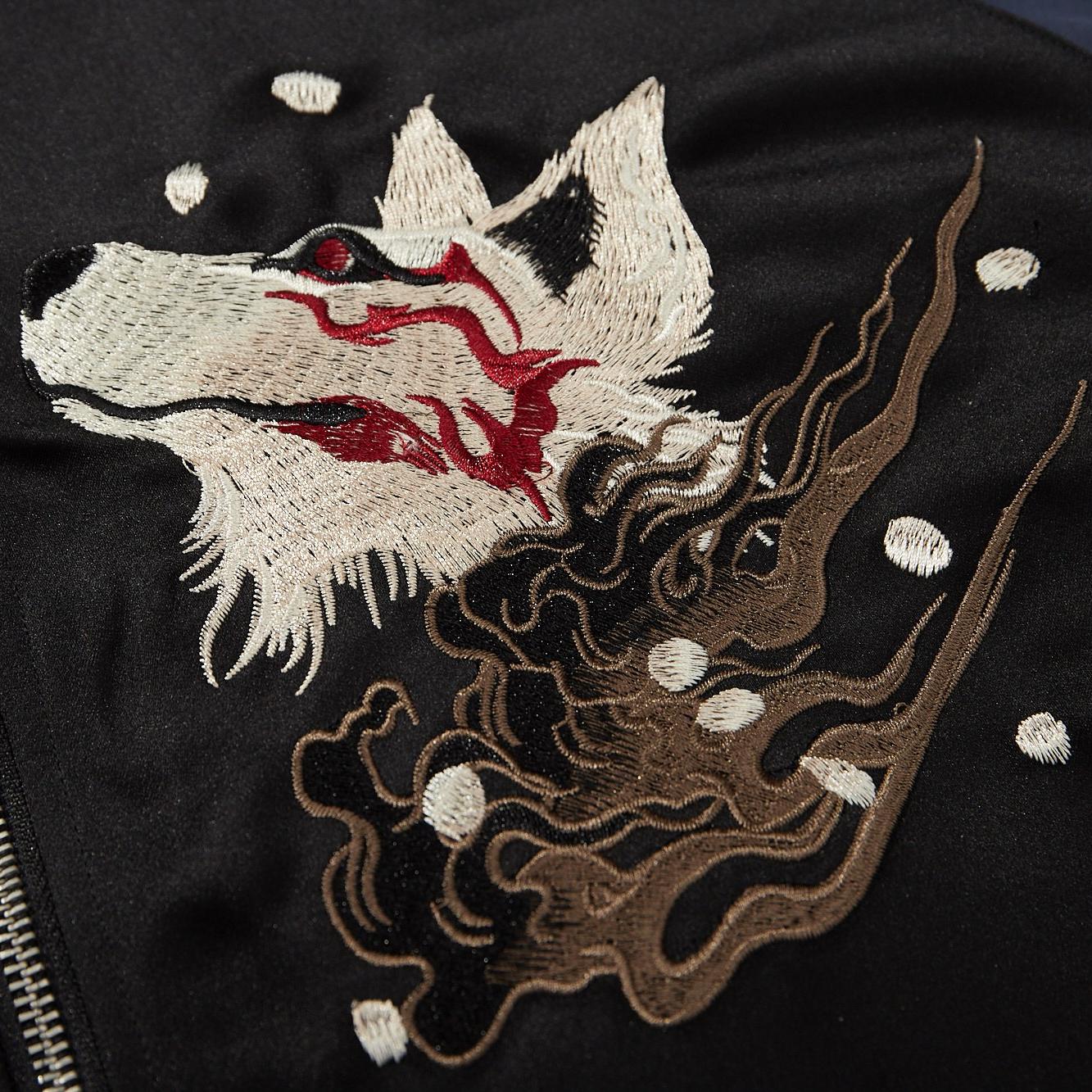 Close-up of the fox-spirit chest embroidery with flowing smoke details