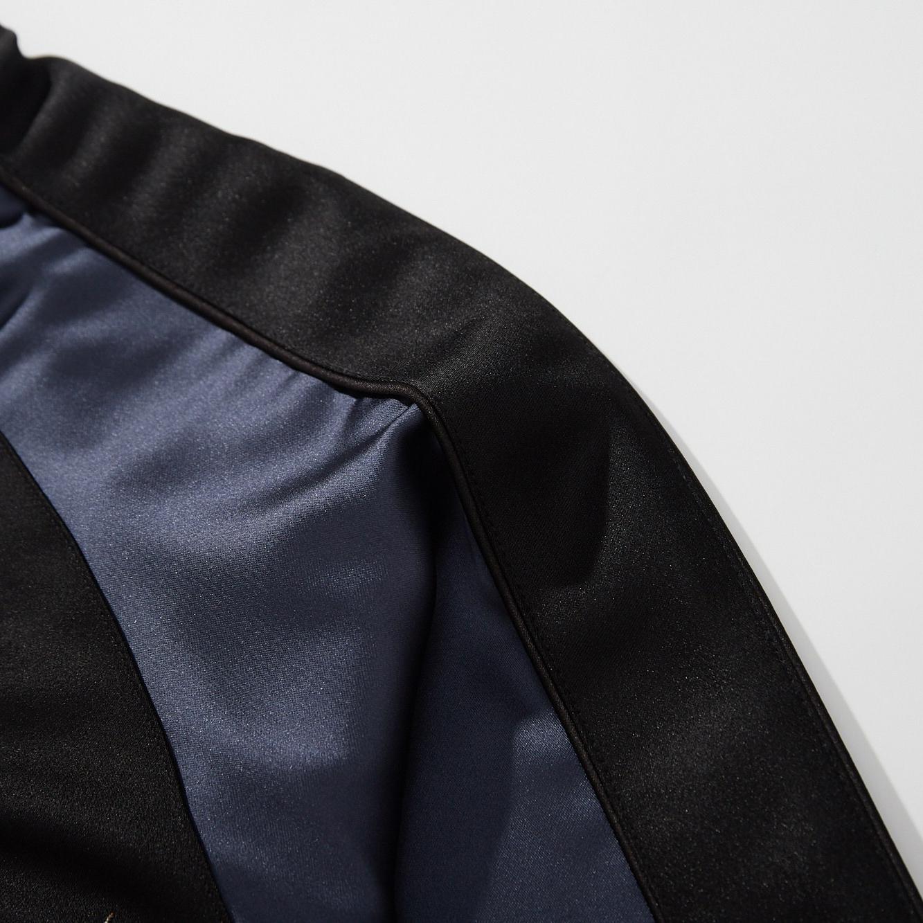 Satin shoulder panel with black top stripe and piping