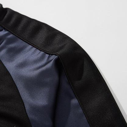 Satin shoulder panel with black top stripe and piping
