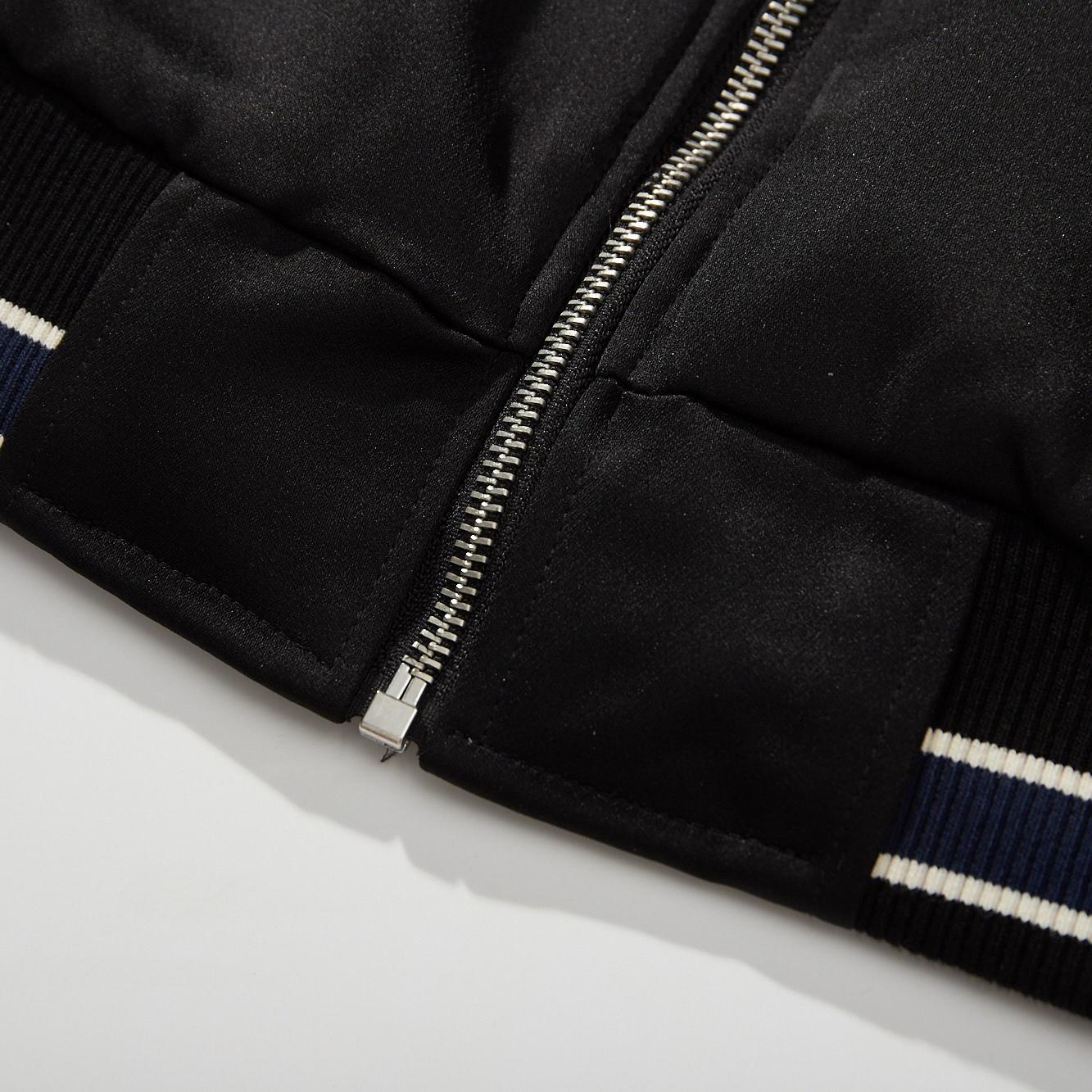 Metal front zipper and reinforced placket seam of sukajan jacket