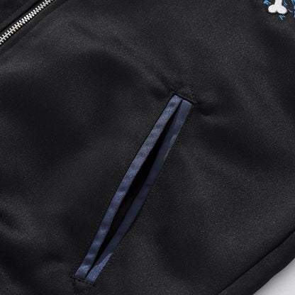Slanted pocket with navy satin welt detail