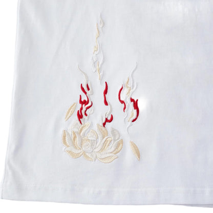 Front view of white pure cotton T-shirt featuring a subtle burning lotus embroidery on the hem.