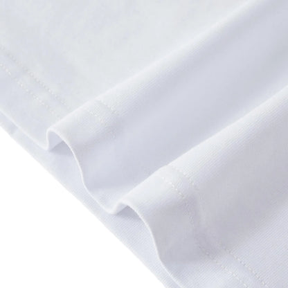 Close-up of the elegant burning lotus embroidery on the white cotton fabric.