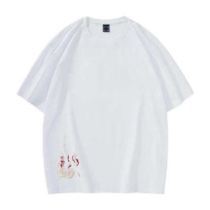 Front view of white cotton T-shirt featuring a subtle spirit flame and lotus embroidery detail.