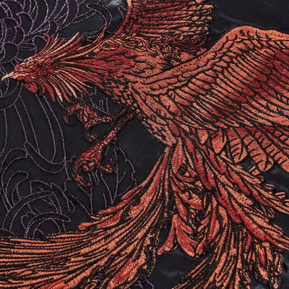 Detailed shot of the high-density embroidery featuring the Vermilion Bird flying over the Black Tortoise.