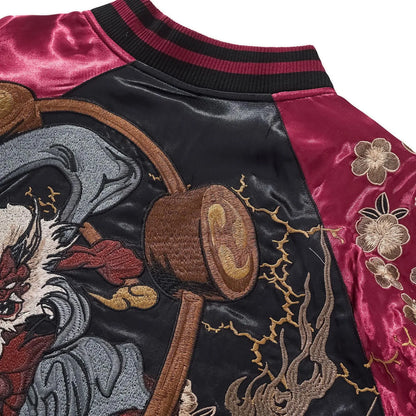 Back shoulder view showing the connection between the ribbed collar and the Thunder God's drums.