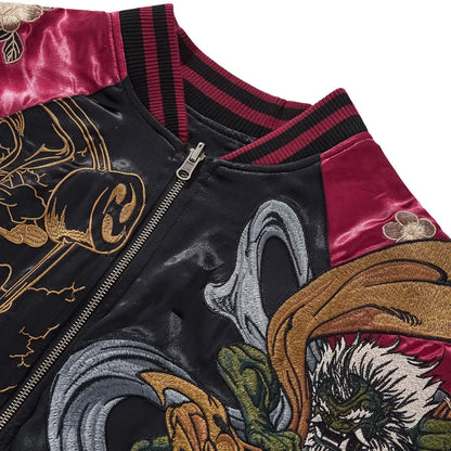 Top view of the ribbed collar and burgundy sleeve featuring cherry blossom embroidery.