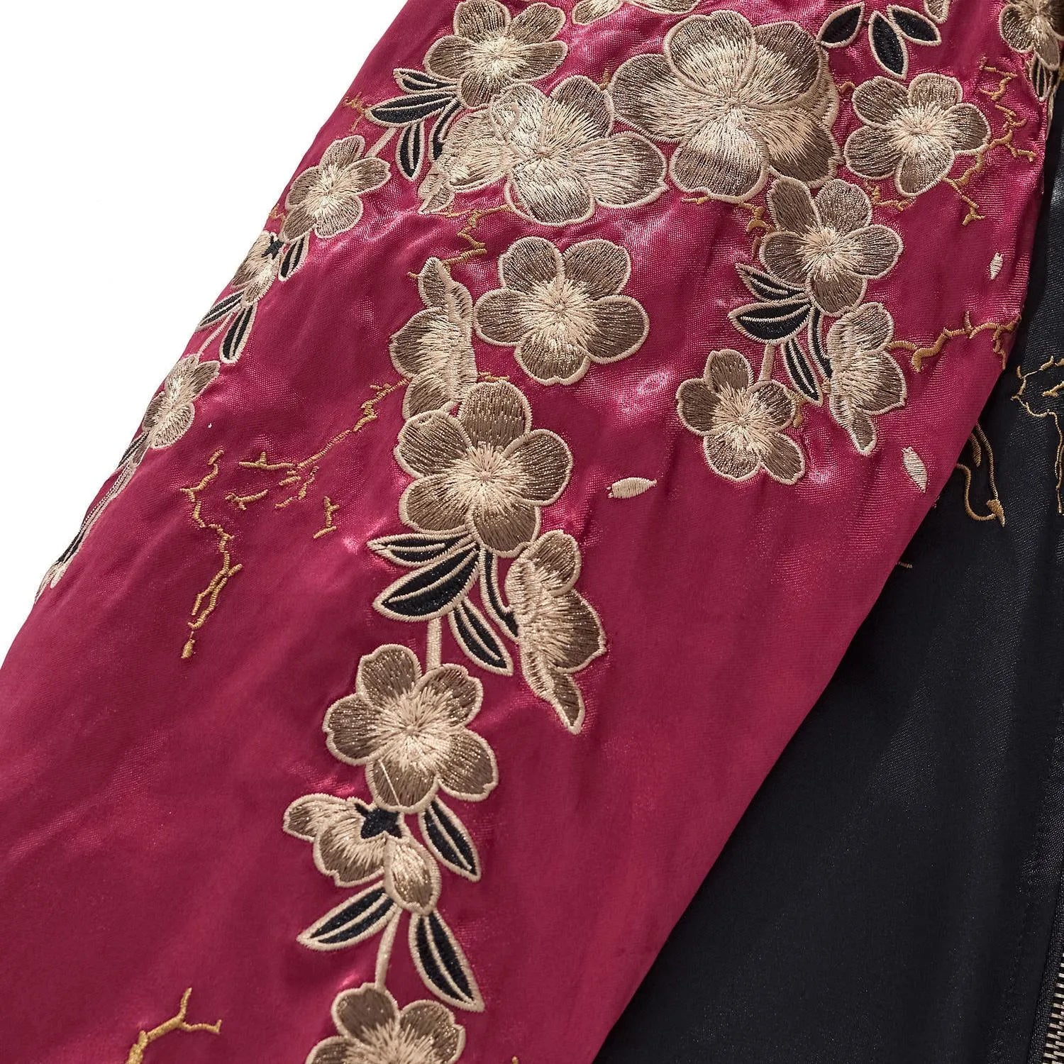 Close-up of the detailed Sakura (Cherry Blossom) embroidery on the burgundy rayon sleeve.
