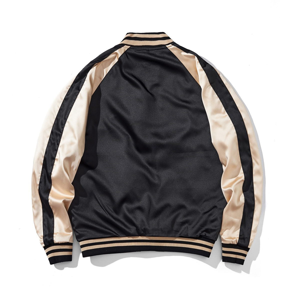 Back view of the beige colorway, peony face, with a smooth satin panel and raglan sleeves