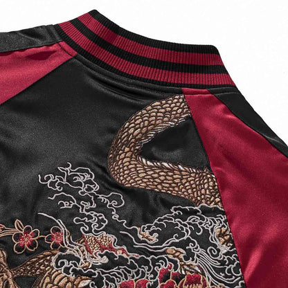 Back yoke detail—dragon tail scales with swirling cloud embroidery.