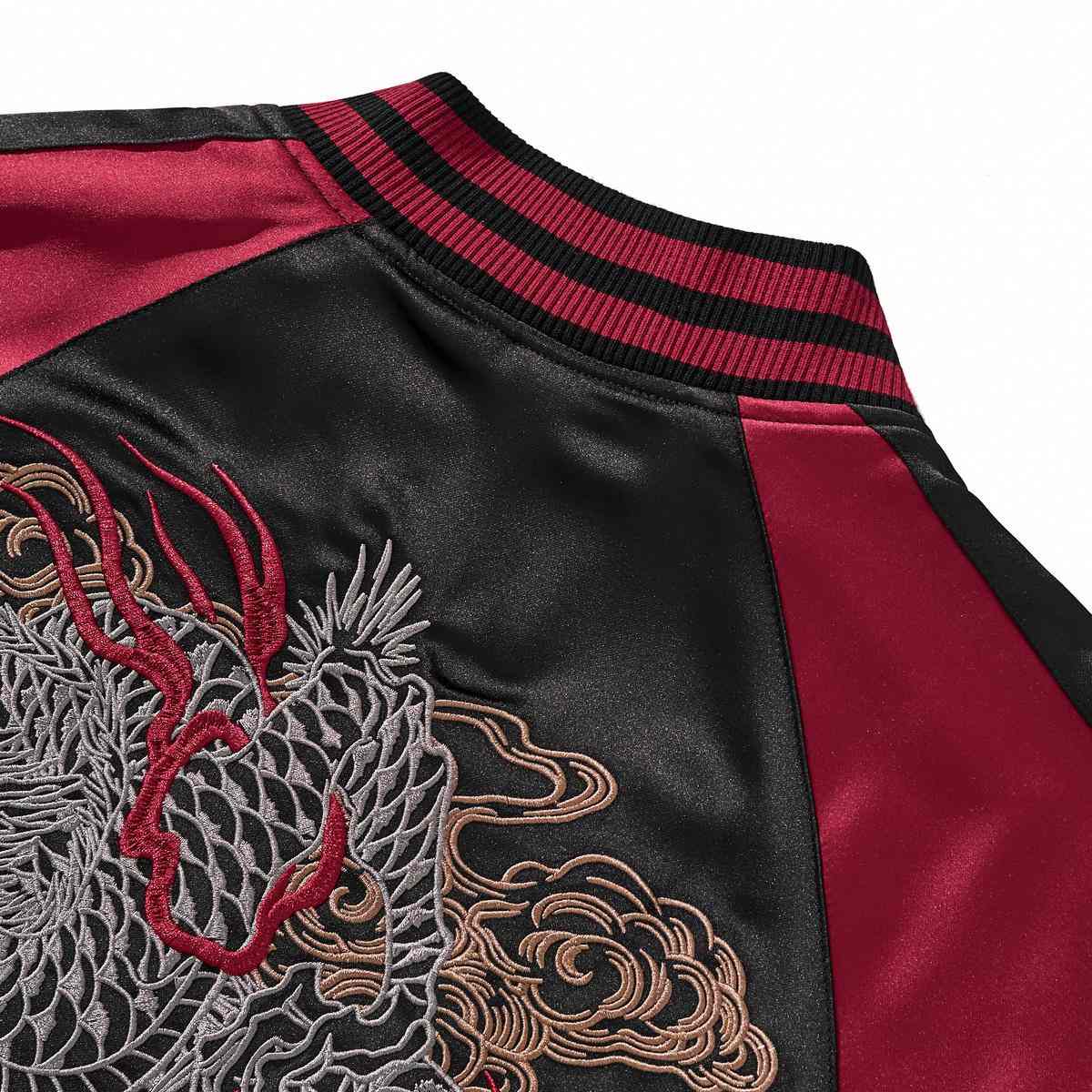 Back detail—dragon head outline with horns and cloud scrolls.