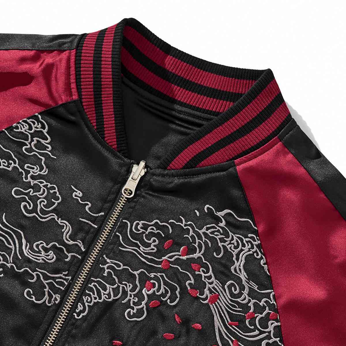 Front collar detail with cloud scrolls and falling petal embroidery.