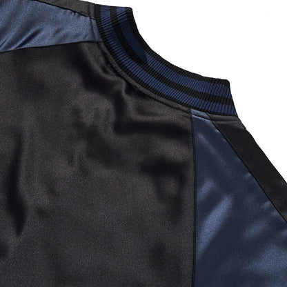 Back collar close-up showing striped rib and satin