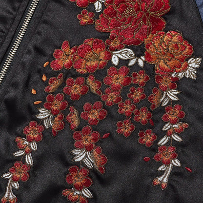 Peony and cherry blossom embroidery cascading across the front panel