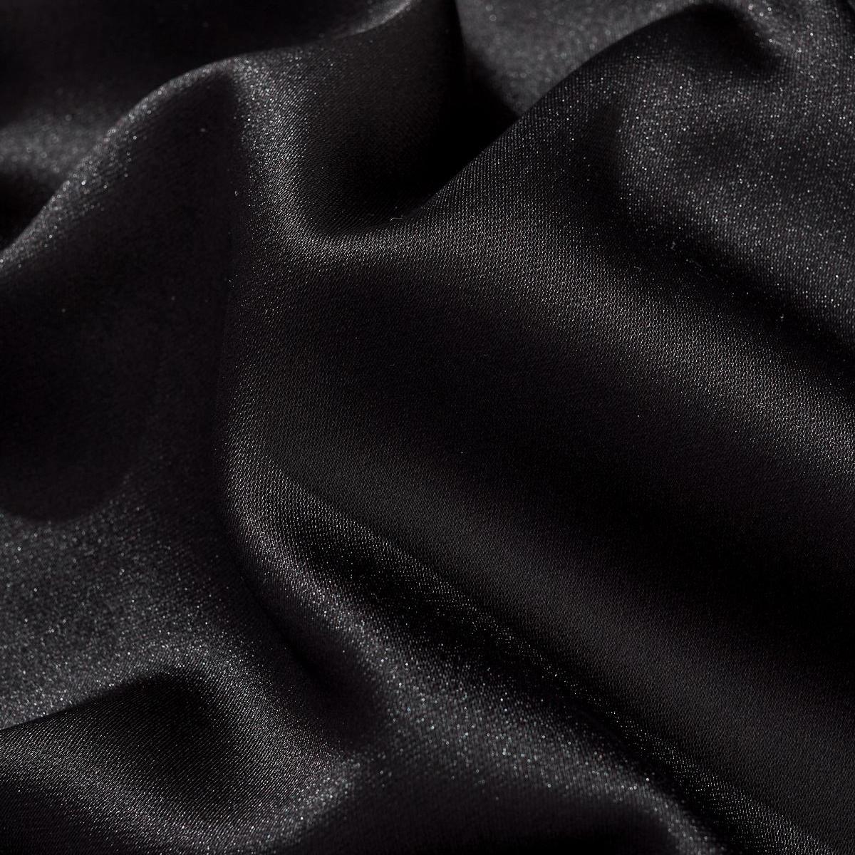 Satin fabric macro showing smooth luster and fine weave