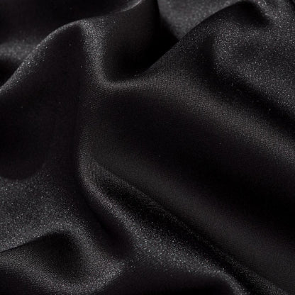 Satin fabric macro showing smooth luster and fine weave