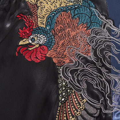 Detailed shot of the Vermilion Bird (Phoenix) chest embroidery.