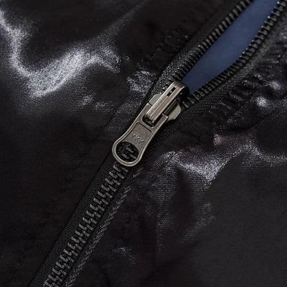 Macro shot of the durable metal YKK zipper pull.